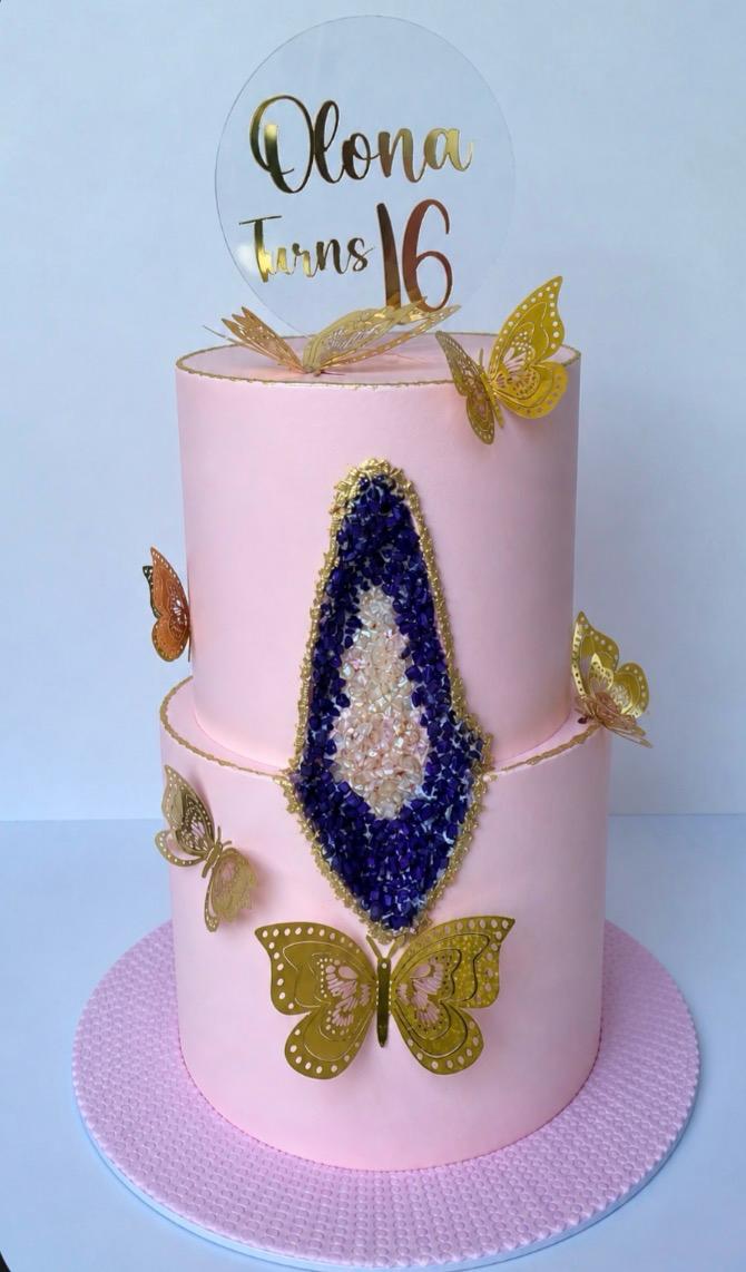 Colourful two-tier children's birthday cake