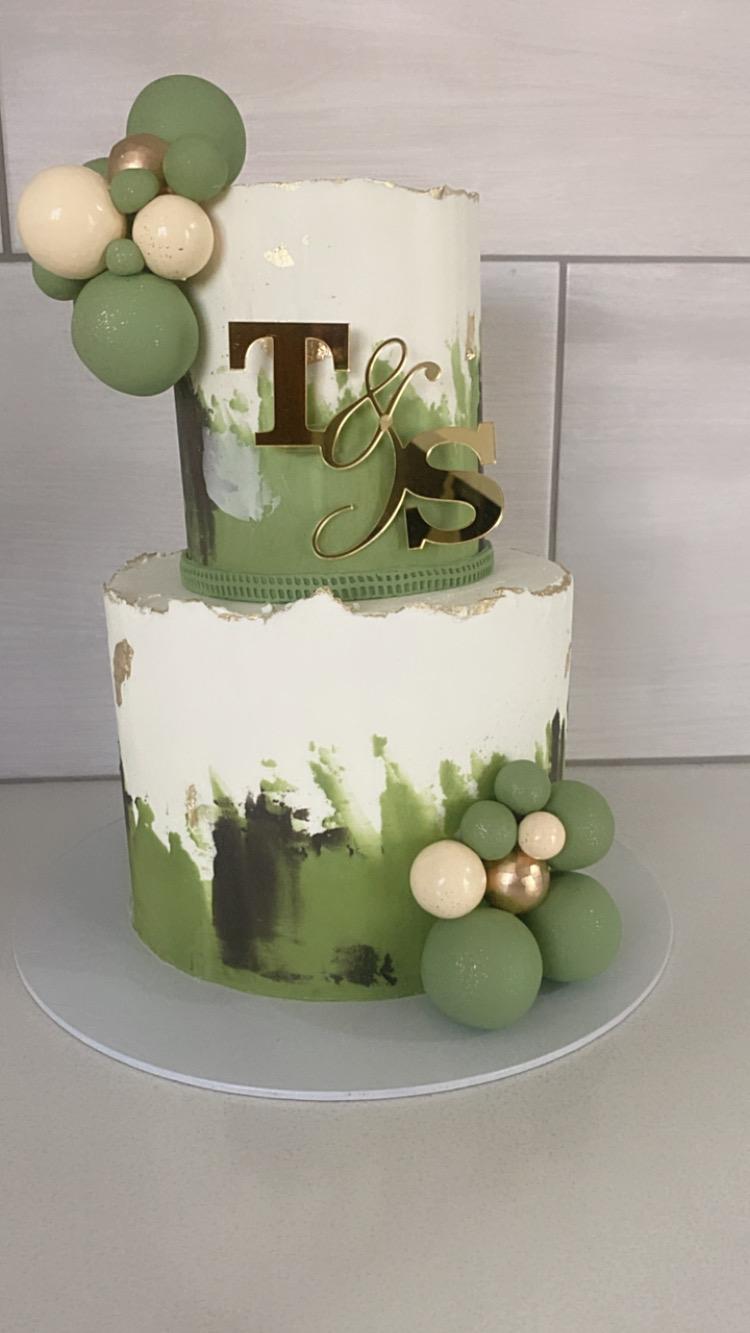 Two-tier olive green wedding cake